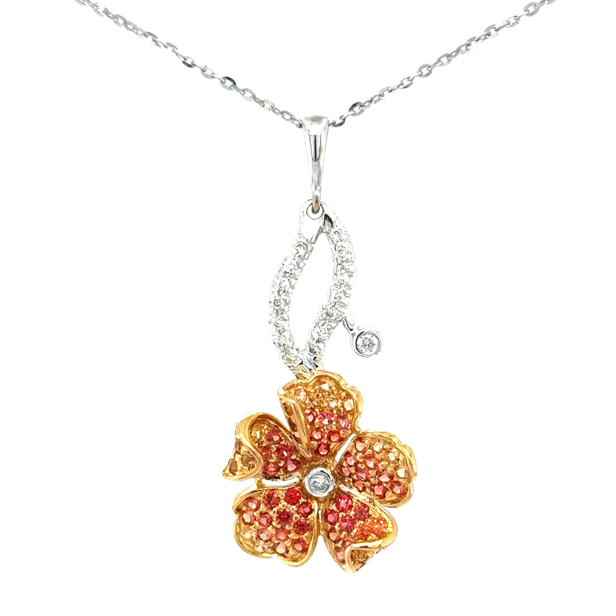 18K 2tone H-I VS2 Dia and treated sapph flower pend